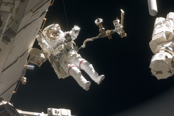 
	This is one of a series of digital still images showing astronaut Dave Wolf performing his second spacewalk and the Endeavour's second also of the scheduled five overall in a little over a week's time to continue work on the International Space Station. The equipment floating in front of Wolf is tethered to his spacesuit. Astronauts Wolf and Tom Marshburn (out of frame), both mission specialists, successfully transferred a spare KU-band antenna to long-term storage on the space station, along with a backup coolant system pump module and a spare drive motor for the station's robot arm transporter. Installation of a television camera on the Japanese Exposed Facility experiment platform was deferred to a later spacewalk.
	
	Credit: http://spaceflight.nasa.gov/gallery/images/shuttle/sts-127/html/s127e007096.html