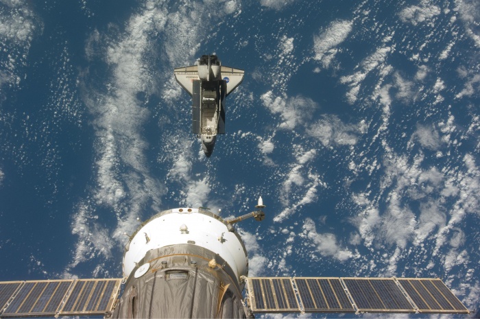 
	Backdropped by a blue and white Earth, this image shows Endeavour shortly after the shuttle and station began their post-undocking separation.

	Credit: http://spaceflight.nasa.gov/gallery/images/shuttle/sts-127/html/iss020e026049.html