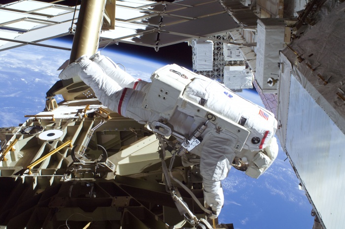 
	Astronaut Mike Foreman, STS-129 mission specialist, participates in the mission's first session of extravehicular activity (EVA) as construction and maintenance continue on the International Space Station. During the six-hour, 37-minute spacewalk, Foreman and astronaut Robert L. Satcher Jr. (out of frame), mission specialist, installed a spare S-band antenna structural assembly to the Z1 segment of the station's truss, or backbone. Foreman and Satcher also installed a set of cables for a future space-to-ground antenna on the Destiny laboratory and replaced a handrail on the Unity node with a new bracket used to route an ammonia cable that will be needed for the Tranquility node when it is delivered next year. The two spacewalkers also repositioned a cable connector on Unity, checked S0 truss cable connections, and lubricated latching snares on the Kibo robotic arm and the station's mobile base system.
	Date: 19 November 2009
	
	Credit: NASA