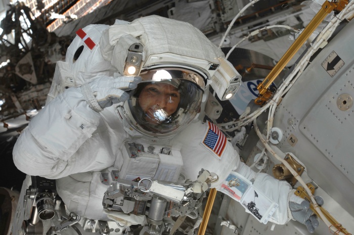 
	Astronaut Randy Bresnik, STS-129 mission specialist, salutes crewmates while positioned near the European Space Agency's Columbus module on International Space Station. Astronauts Bresnik and Mike Foreman were in the midst of the second of three scheduled spacewalks for this shuttle crew, working in cooperation with the five current crewmembers for the orbital outpost and with their five Atlantis crewmates, all of whom pitched in EVA support from inside.
	Date: 21 November 2009
	
	Source: http://spaceflight.nasa.gov/gallery/images/shuttle/sts-129/html/s129e007213.html