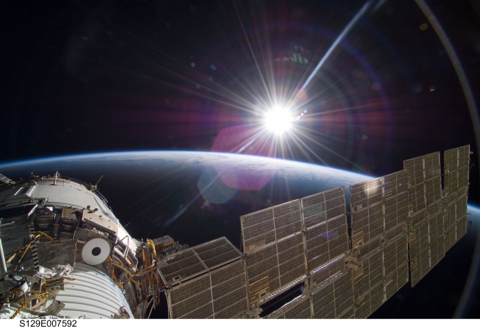 
	The bright sun greets the International Space Station in this Nov. 22 scene from the Russian section of the orbital outpost, photographed by one of the STS-129 crew members.
	Date: 24 November 2009
	
	Source: http://spaceflight.nasa.gov/gallery/images/shuttle/sts-129/hires/s129e007592.jpg