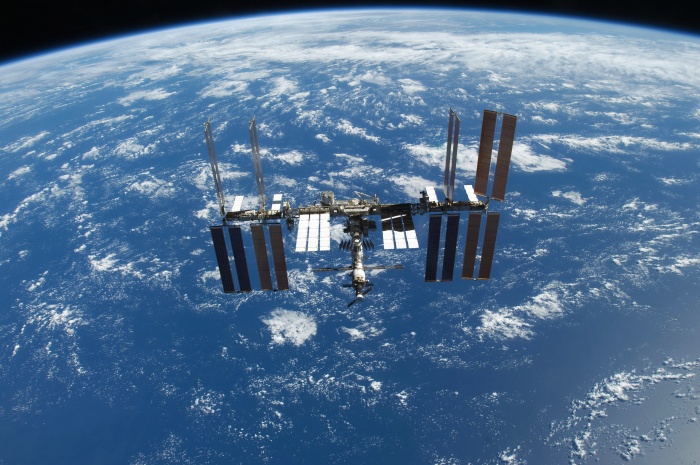
	International Space Station Oorbiting high above the blue sea and white clouds, November 25, 2009
	As Seen From Space Shuttle Atlantis (STS-129)
	
	Credit: NASA
