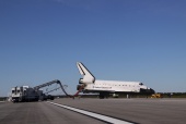 Space Shuttle Atlantis (STS-129) Is towed from the Shuttle landing facility
