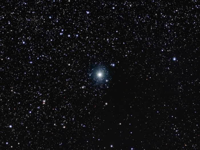 
	The Mystery of the Fading Star
	Image Credit & Copyright: Alson Wong and Citizen Sky
	Astronomy Picture of the Day - 2010 January 8
	
	Explanation: Every 27 years Epsilon Aurigae fades, remaining dim for roughly two years before growing bright again. Since the 19th century, astronomers have studied the mystery star, eventually arguing that Epsilon Aur, centered in this telescopic skyview, was actually undergoing a long eclipse by a dark companion object. But the nature of the companion and even the state of bright star itself could not be pinned down by observations. Continuing to collect evidence, Citizen Sky, a team of professional and amateur astronomers, is studying the current eclipse of Epsilon Aur, reporting that it began in August 2009 and by late December had reached its deepest point. Epsilon Aur is now expected to remain dim for all of 2010, before rapidly regaining normal brightness in 2011. Meanwhile, recent infrared data from the Spitzer Space Telescope supports a model for the enigmatic system that identifies Epsilon Aur as a large but lower mass star near the end of its life, periodically eclipsed by a single star embedded in a dusty disk. The disk is estimated to have a radius of about 4 AU, or 4 times the Earth-Sun distance, and to be about 0.5 AU thick.