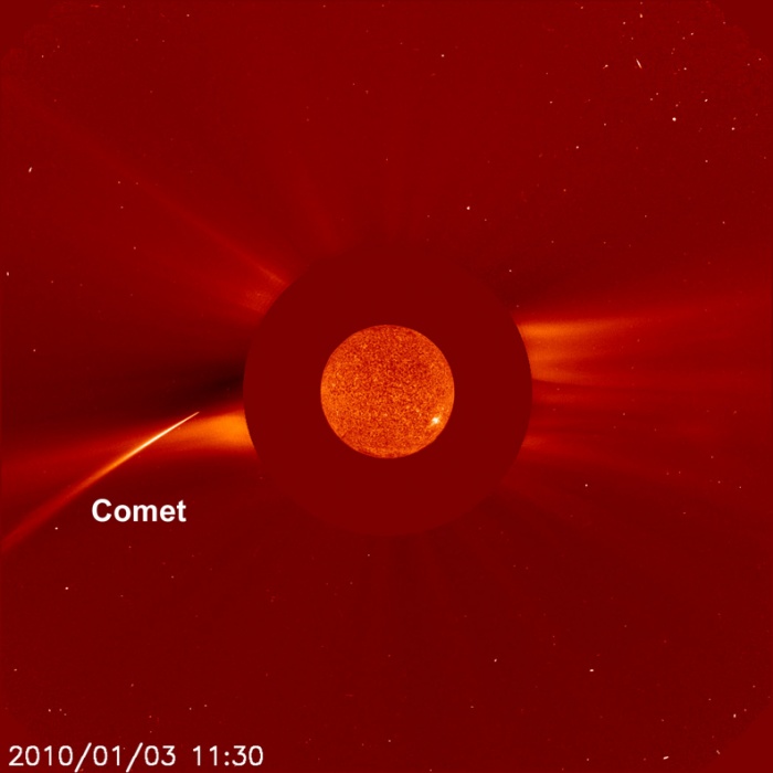 
	New Year Sungrazer
	Credit: LASCO, SOHO Consortium, NRL, ESA, NASA
	Astronomy Picture of the Day - 2010 January 16
	
	Explanation: Intense and overwhelming, the direct glare of the Sun is blocked by the smooth occulting disk in this image from the sun-staring SOHO spacecraft. Taken on January 3rd, an extreme ultraviolet image of the Sun to scale, is superimposed at the center of the disk. Beyond the disk's outer boundary is a sungrazer comet, one of the brightest yet seen by SOHO. The comet was discovered (movie link) by Australian amateur astronomer Alan Watson, while examining earlier images from another sun-watching spacecraft, STEREO-A. Based on their orbits, sungrazers are believed to belong to the Kreutz family of comets, created by successive break ups from a single large parent comet that passed very near the Sun in the twelfth century. Subjected to strong tidal forces and intense solar heat, this sungrazer comet did not survive its close encounter.