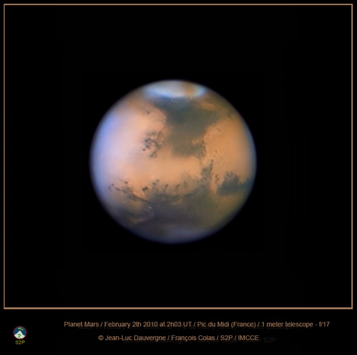 
	Dust Storm on Mars
	Credit & Copyright: Jean-Luc Dauvergne, Francois Colas, IMCCE/S2P, Obs. Midi-Pyrénées
	Astronomy Picture of the Day - 2010 February 5
	
	Explanation: It's spring for the northern hemisphere of Mars and spring on Mars usually means dust storms. So the dramatic brown swath of dust (top) marking the otherwise white north polar cap in this picture of the Red Planet is not really surprising. Taking advantage of the good views of Mars currently possible near opposition and its closest approach to planet Earth in 2010, this sharp image shows the evolving dust storm extending from the large dark region known as Mare Acidalium below the polar cap. It was recorded on February 2nd with the 1 meter telescope at Pic Du Midi, a mountain top observatory in the French Pyrenees.