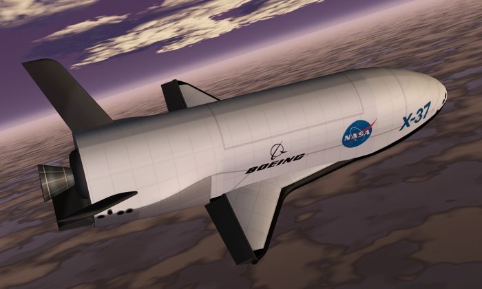 An artist's conception of the X-37 Advanced Technology Demonstrator as it glides to a landing on earth. Its design features a rounded fuselage topped by an experiment bay; short, double delta wings (like those of the Shuttle orbiter); and two stabilizers (that form a V-shape) at the rear of the vehicle.