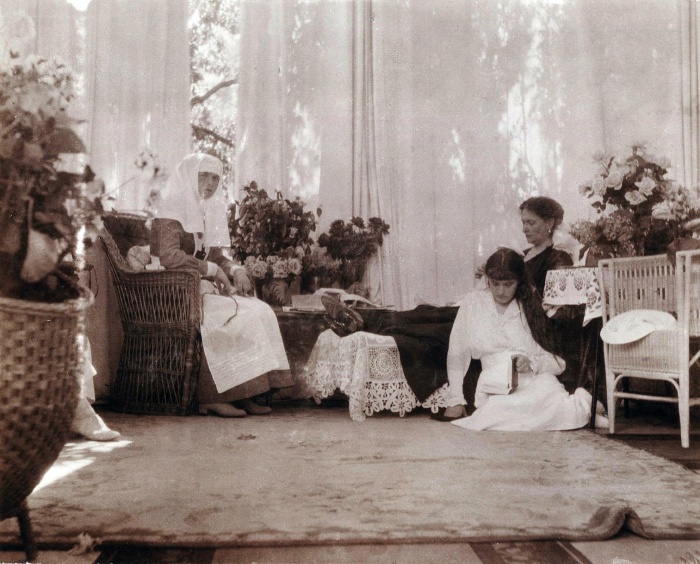 Grand Duchess Anastasia sits with her mother, Alexandra, and sister Olga in her mother's sitting room ca. 1916. This photo of Grand Duchess Olga and Anastasia Nikolaevna of Russia and Tsarina Alexandra is from the Beinecke Library. It can be used if credit is given to the library. The correct credit line is Romanov Collection, General Collection, Beinecke Rare Book and Manuscript Library, Yale University. The address is http://beinecke.library.yale.edu/dl_crosscollex/SearchExecXC.asp