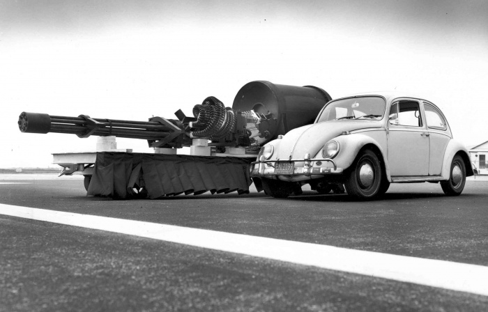 The GAU-8/A Avenger Gatling gun next to a VW Type 1. Removing an installed GAU-8 from an A-10 requires first installing a jack under the aircraft's tail as the cannon makes up most of the aircraft's forward weight.