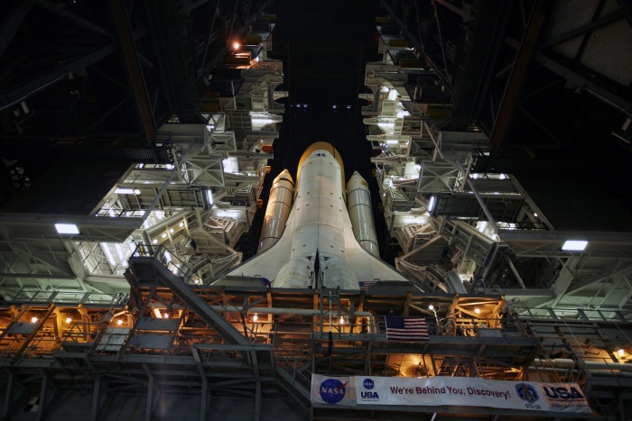 
	Launch Pad Awaits
	
	Space shuttle Discovery, installed on the mobile launcher platform atop the crawler-transporter, is poised to begin moving on the crawlerway at NASA's Kennedy Space Center in Florida to Launch Pad 39A.
	
	Rollout was delayed approximately 2 hours due to lightning in the area.
	
	Photo credit: NASA/Dimitri Gerondidakis
	August 4, 2009