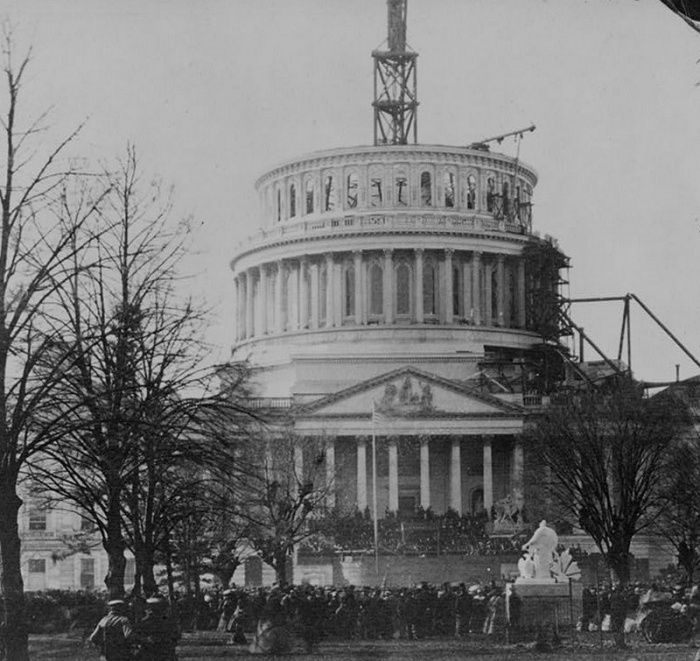 
	Abraham Lincoln Was Sworn In Under a Half-Finished Capitol Dome
	

	As Abraham Lincoln took the oath of office on March 4, 1861, the United States was in crisis. Southern states had been seceding, and it seemed that Civil War was unavoidable. There was fear that Lincoln would be assassinated before he could take the oath, and General Winfield Scott ordered Army sharpshooters placed on the roofs of buildings in Washington.
	
	The US Capitol was undergoing expansion, and the new cast iron dome was still being assembled atop the building in early 1861. Lincoln's inauguration was thus held before the half-finished dome. 
	Source: Robert McNamara, About.com