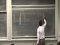 Introducing the wave function and meaning of wave-particle duality