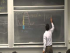 Introducing the wave function and meaning of wave-particle duality