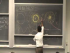Confining electrons to Bohrs radii, orbitals and introducing the Schrodinger equation