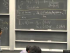 Scanning tunneling microscopy, alpha decay and world's smallest movie